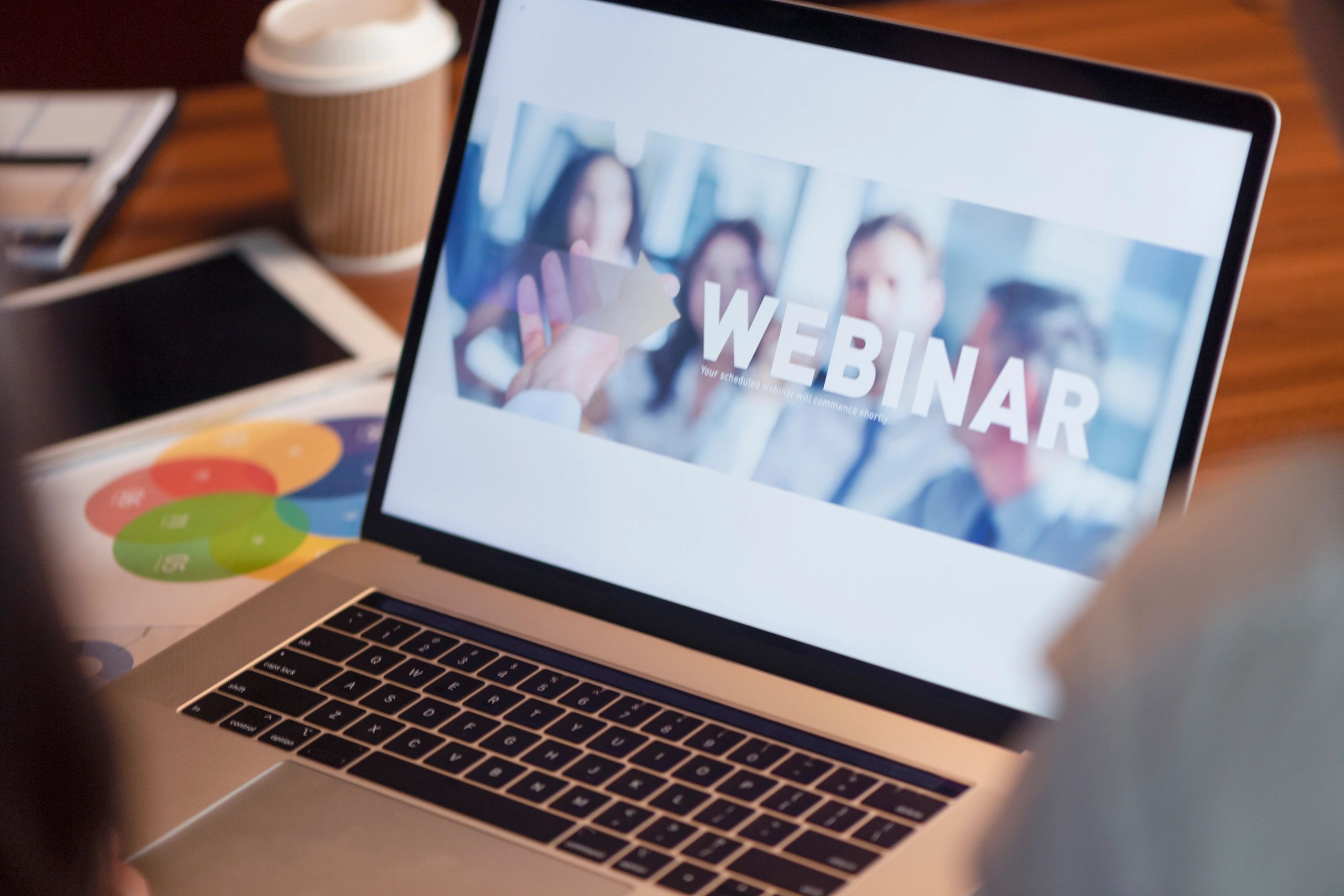 A laptop with the word webinar on it.